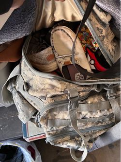 Box of shoes big duffel bag as well and a bag of jeans