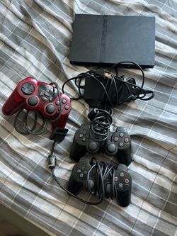 Ps2 skin with 3 controllers and power cord