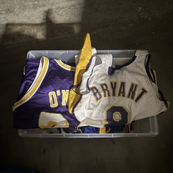 Bin of sports jerseys 