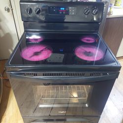 5 yr old Whirlpool 4 Burner glass top stove works excellent