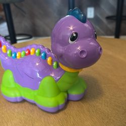 Dinosaur electronic learning toy