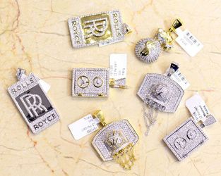 Sterling silver and gold color pendents..