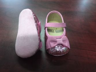 Kate Spade pink glitter baby shoe