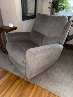 Gray rocker recliner