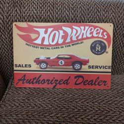 HOT WHEELS METAL SIGN.  12" X 8".  NEW.  PICKUP ONLY.