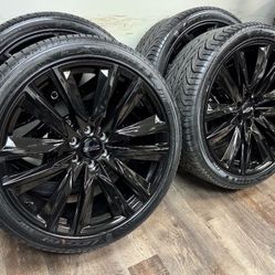 NEW 24 inch gloss black Gm style wheels wrapped in Lexani 305/35r24 tires