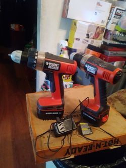 2 BLACK & DECKER 12VOLT MULTIPLE SPEED DRILLS WITH BATTERYS & A CHARGER BOTH R VERY STRONG & WORK GREAT