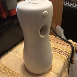 Automatic room freshener