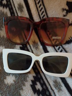 Ladies Sunglasses, One Leopard Print And White Frames.