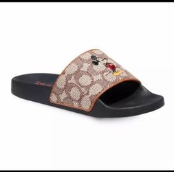 Coach x Disney 50th Anniversary Mickey Mouse slides.