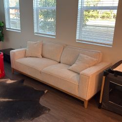 White Couch With Pillows