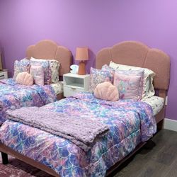 TWO PINK TWIN BED + MATTRESSES 