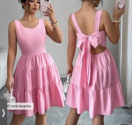 Pink sleeveless tiered mini dress with bow black