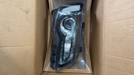 Drivers side Chrysler 300 headlight
