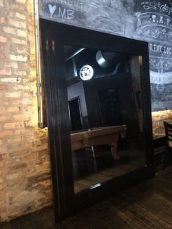 Mirror with wooden frame