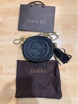 Black Pebbled Leather Round Crossbody with Gold Chain & Tassel