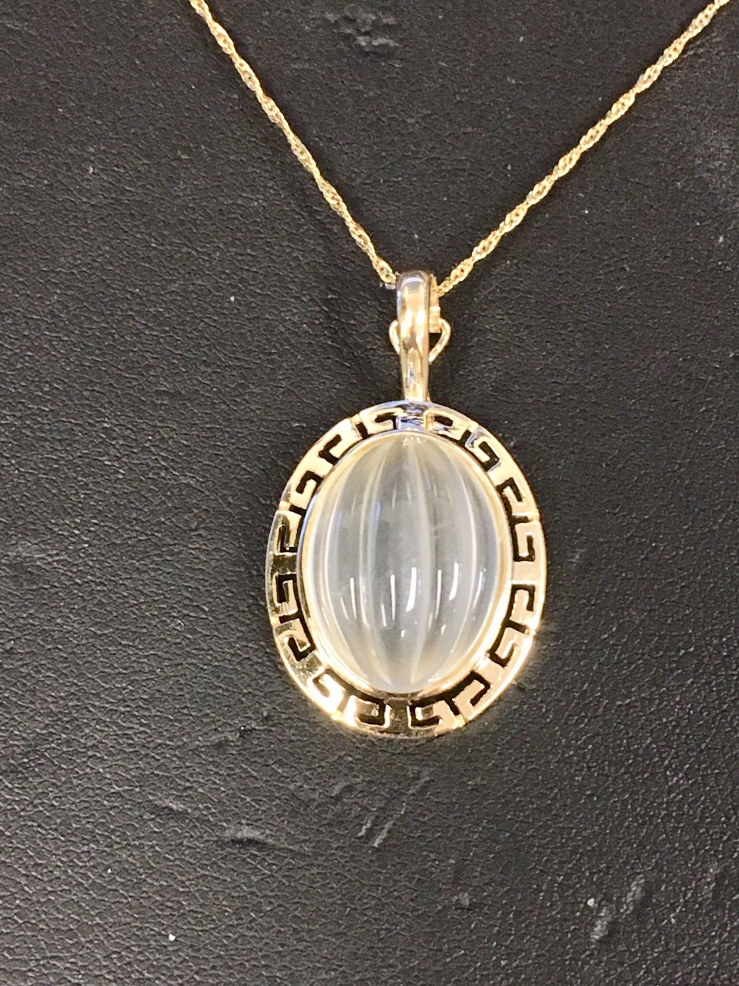 Gold chain and charm