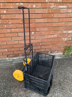 Grocery basket on wells and Rubbermaid mop bucket