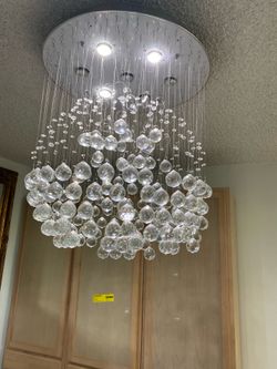 Real Crystal Chandelier for a two story house from wayfair