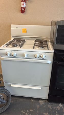 Like new Whirlpool gas stove
