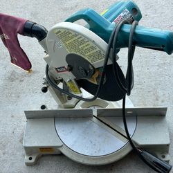 Makita 10” Mitch Saw  With Metal Masonary cutting wheel