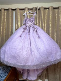 Beautiful light purple ball gown with matching crown, necklace, earrings, bracelet, and bouquet for sale. Worn only once, in perfect like-new conditio