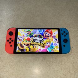 NINTENDO SWITCH OLED + 100 SWITCH GAMES MARIO KART,MARIO PARTY,POKEMON Z-A,ZELDA,MINECRAFT,GTA and More