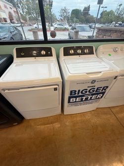 GE Top load washing machine and gas dryer set