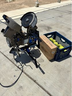 Jr. Hack Attack Softball Pitching Machine + JUGS Dimple Balls