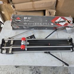 New Rubi RP 30 in. Tile Cutter with 0.31 in. Tungsten Carbide Blade and Adjustable Blade. Retails $260 with Taxes 