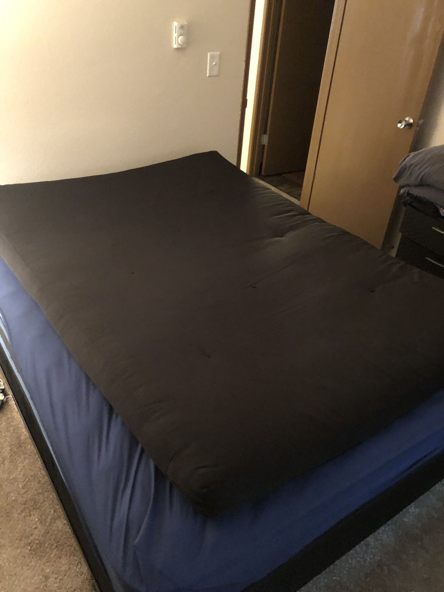 Futon mattress. Just slightly smaller than queen. Will accept best offer