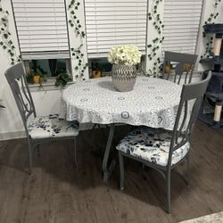 Table With Chairs And Cover 