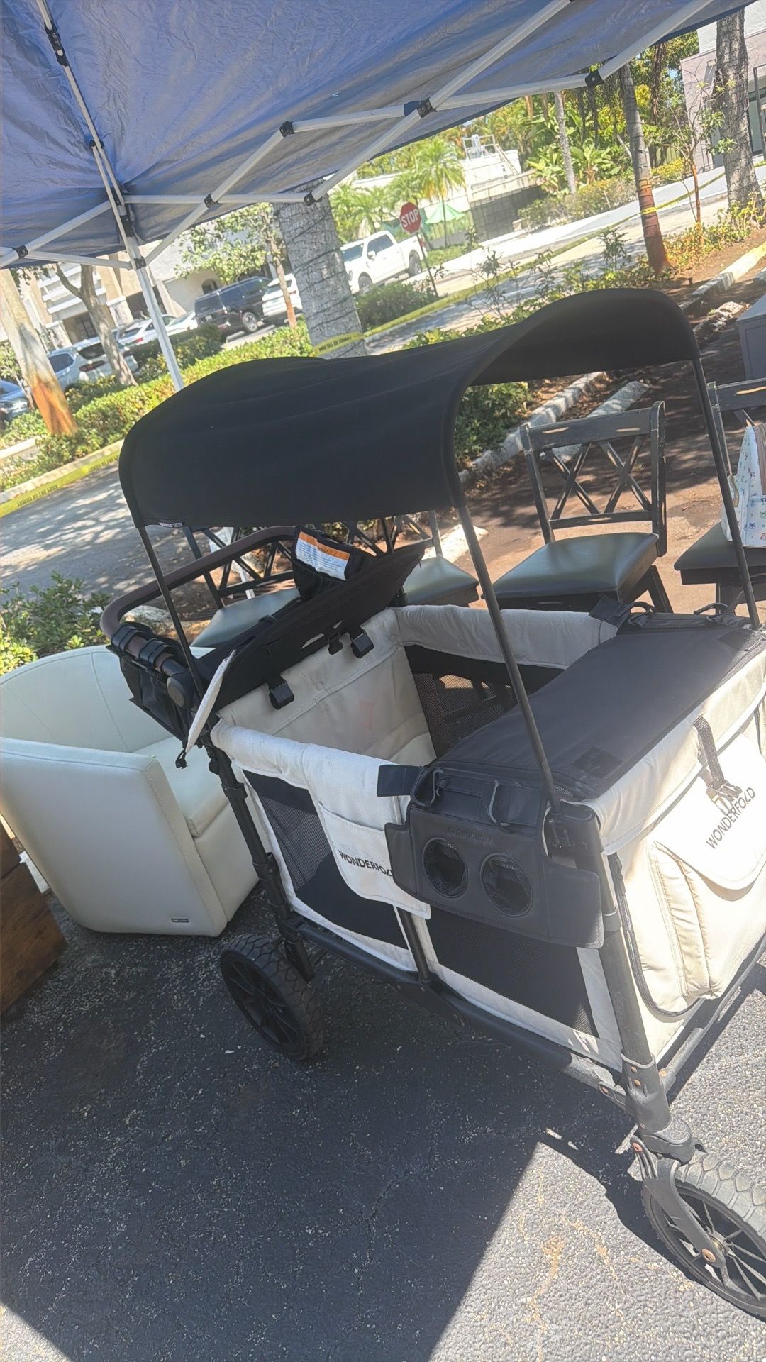 WonderFold W4 Luxe Quad Stroller Wagon