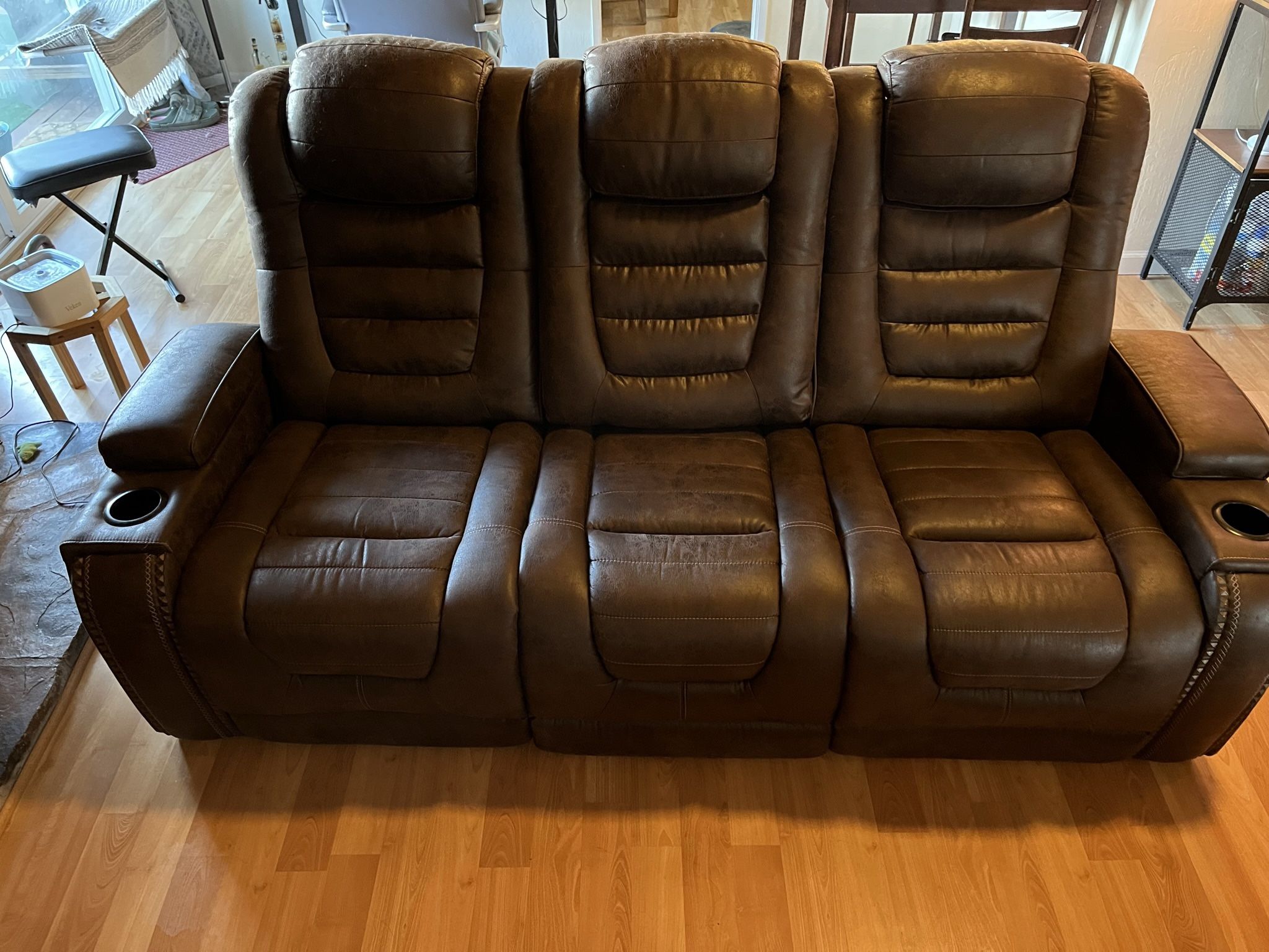 3 Seat Couch With Powered Recliners And Center Console