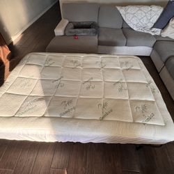 Full Mattress, metal frame, and mattress topper!