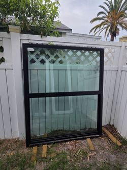 Brand New 52W x 62H PGT Aluminum Window