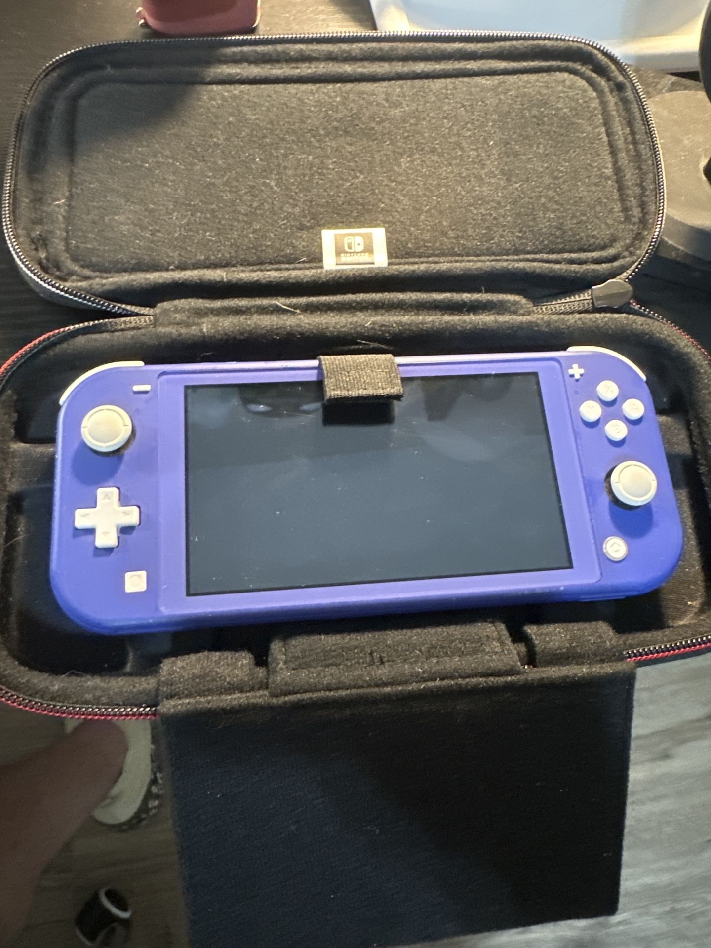 Nintendo Switches (2) + Games