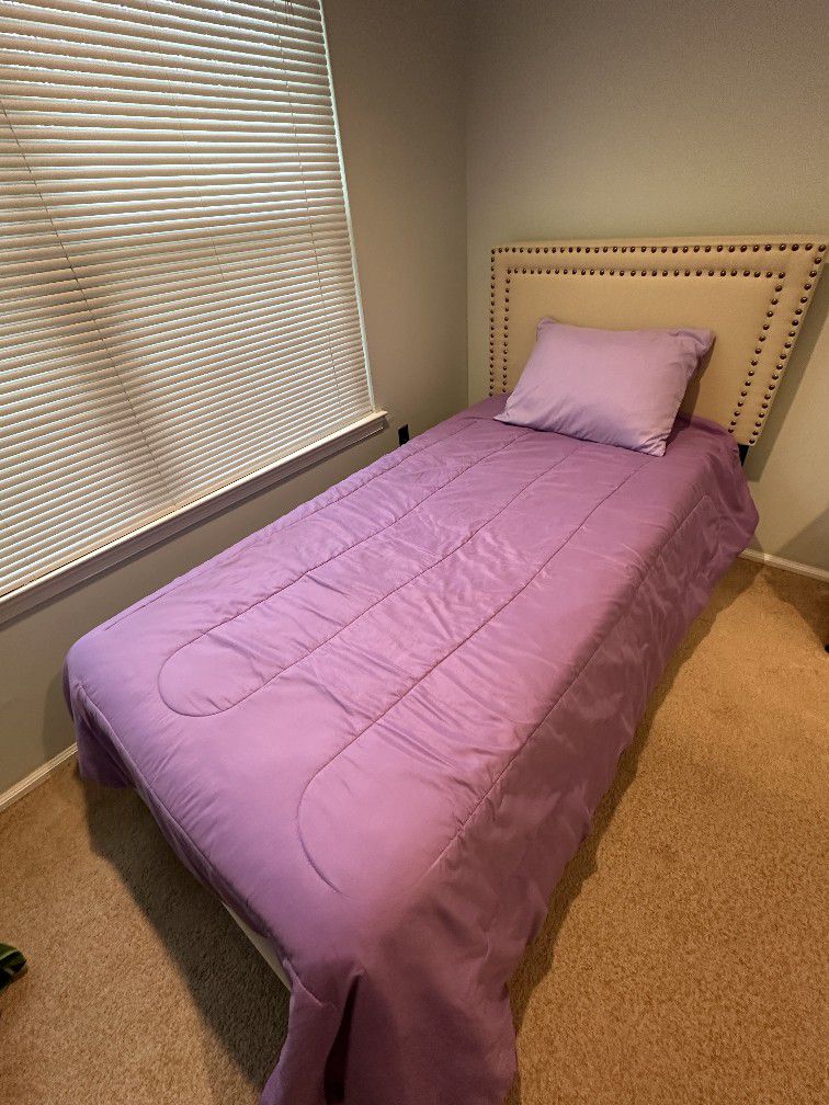 Twin bed with mattress