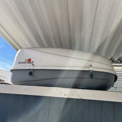 Clam shell roof top storage