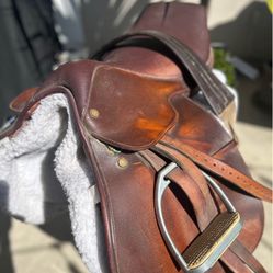 Antique Saddle And Boots