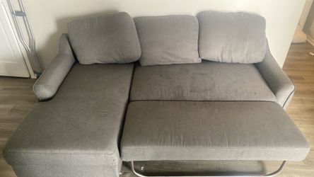 Sectional type couch.