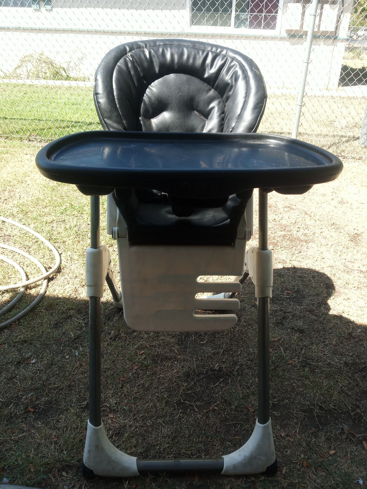 Graco portable black leather high chair