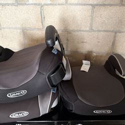 Three Graco Booster Seats