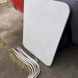 Table. Vintage Formica Table With Metal Rim And Metal Legs 