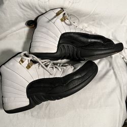 These are Air Jordan 12 Retro sneakers in the "Taxi"