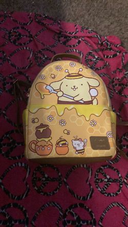 Pompompruin mini bag pack