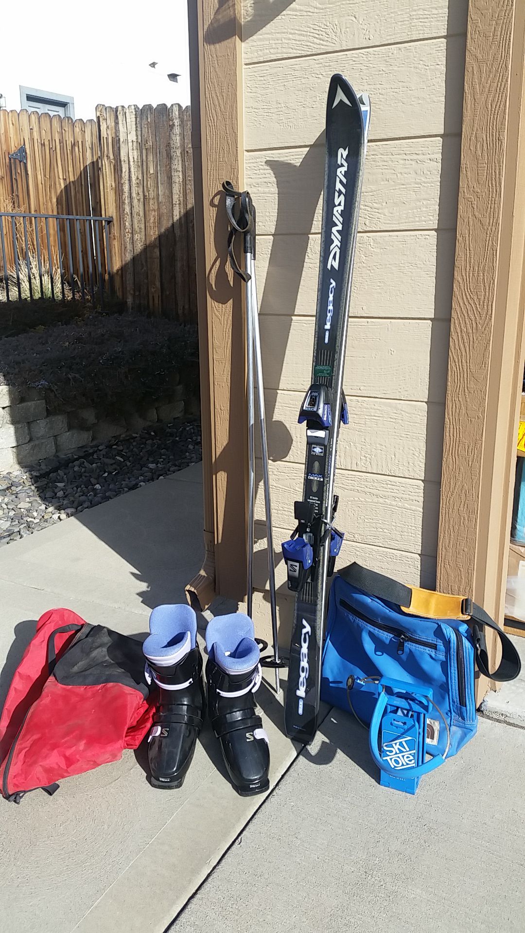 Skies,boots,poles,tote and cover