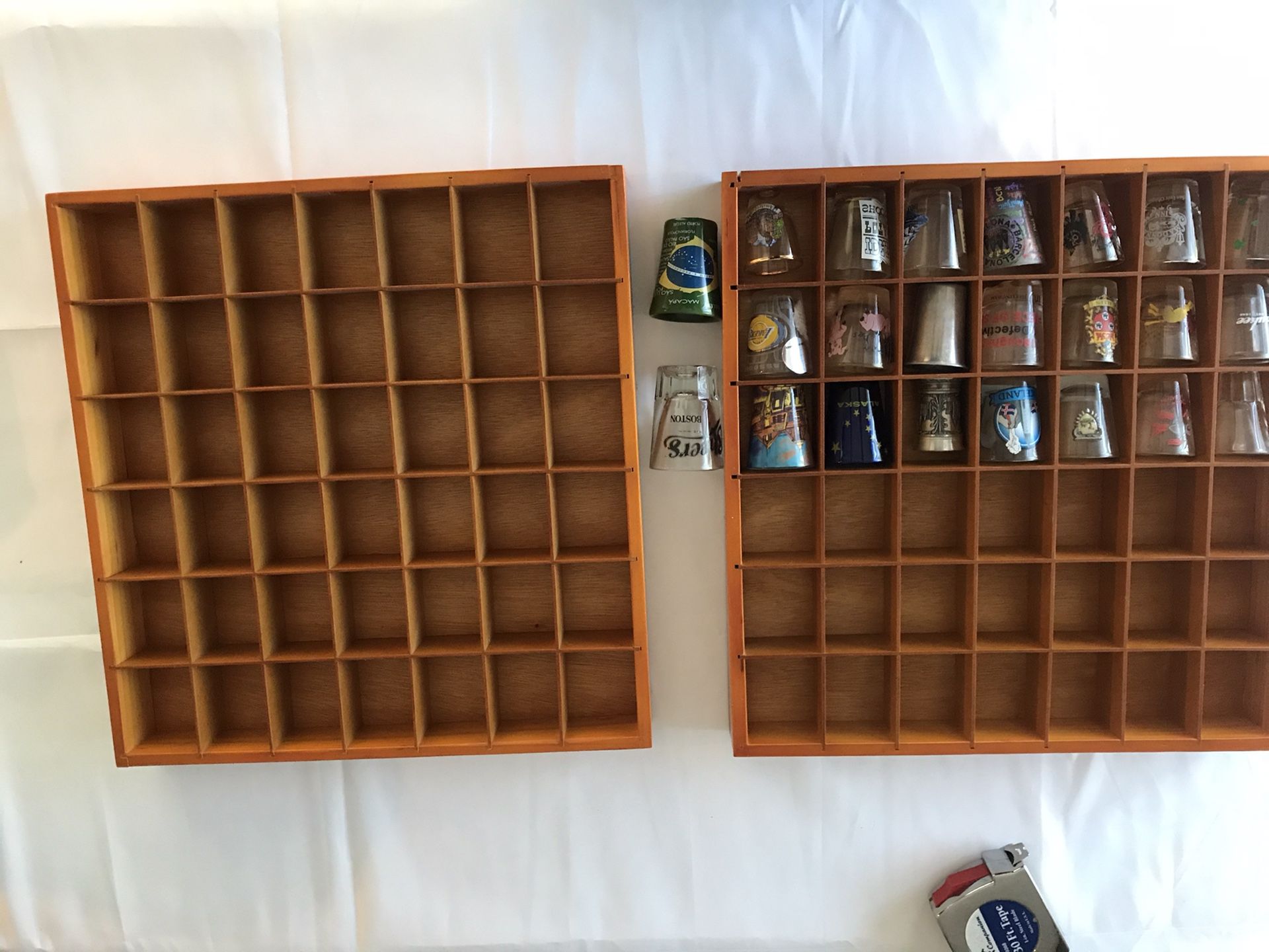 Shot glass display holders & 23 shot glasses