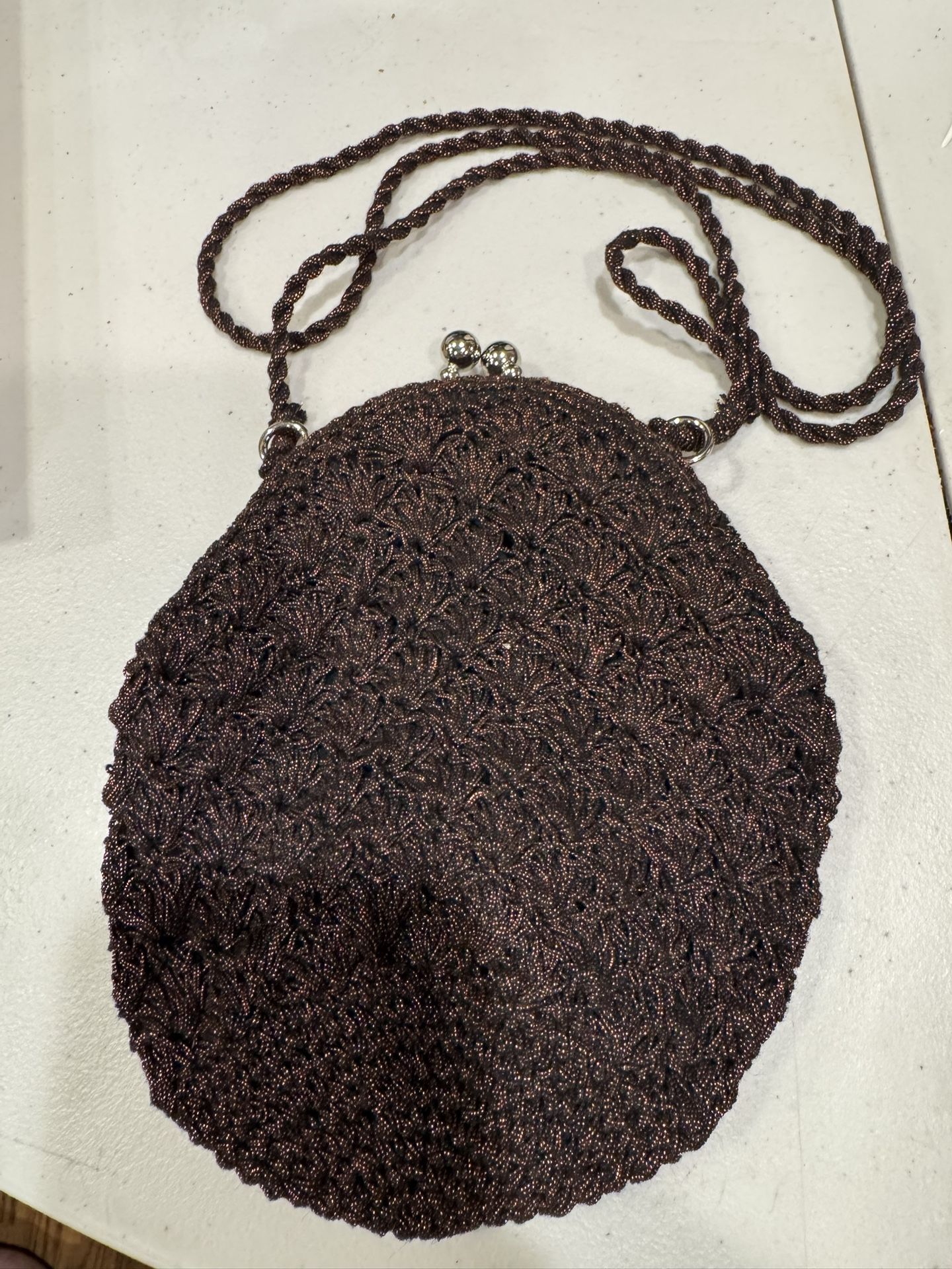 VTG crocheted shimmery bronze toned evening bag-clasp closure twisted strap