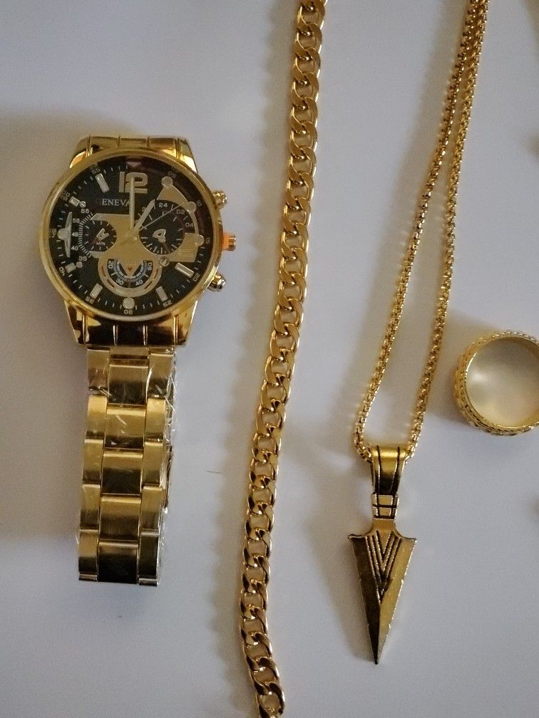 GENEVA MENS WATCH 4 PIECE SET BRACELET,NECKLESS,RING ,WATCH NEW IN PLASTIC DOWELS ON WACTH ARE FOR SHOW ONLY